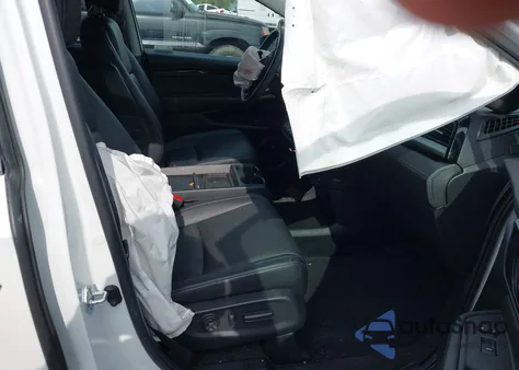 2023 Honda Odyssey Touring z USA, uszkodzony, nr VIN 5FNRL6H80PB004704